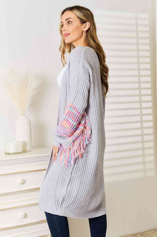 Fringe Sleeve Dropped Shoulder Cardigan - Kawaii Stop - Chic Clothing, Cozy Cardigan, Dropped Shoulder Cardigan, Fall Fashion Essential, Fashionable Layer, Fringe Sleeve Sweater, Machine Washable Sweater, Moderate Stretch, Playful Detail, Ship from USA, Soft and Comfortable, Stylish Outerwear, Trendy Knitwear, Unique Design, Women's Apparel, Woven Right