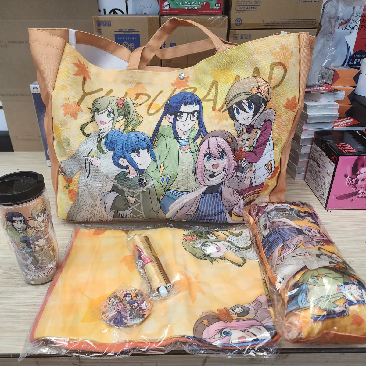 Laid Back Camp Goodie Bag Includes 1 Tumbler 1 Small Pillow 1 Button 1 Small Wallscroll 1 Blanket - Figurines - Figures