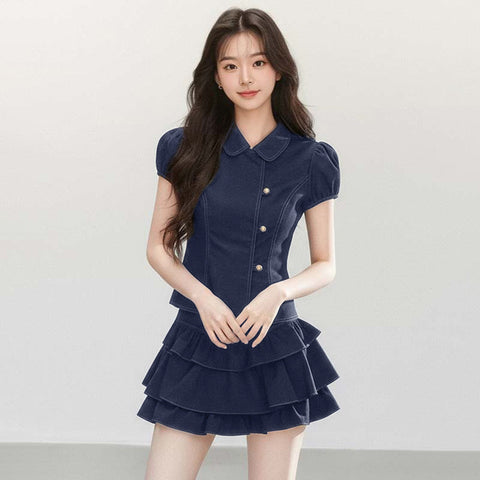 Navy blue Peter Pan collar button-front top and tiered ruffle skirt set