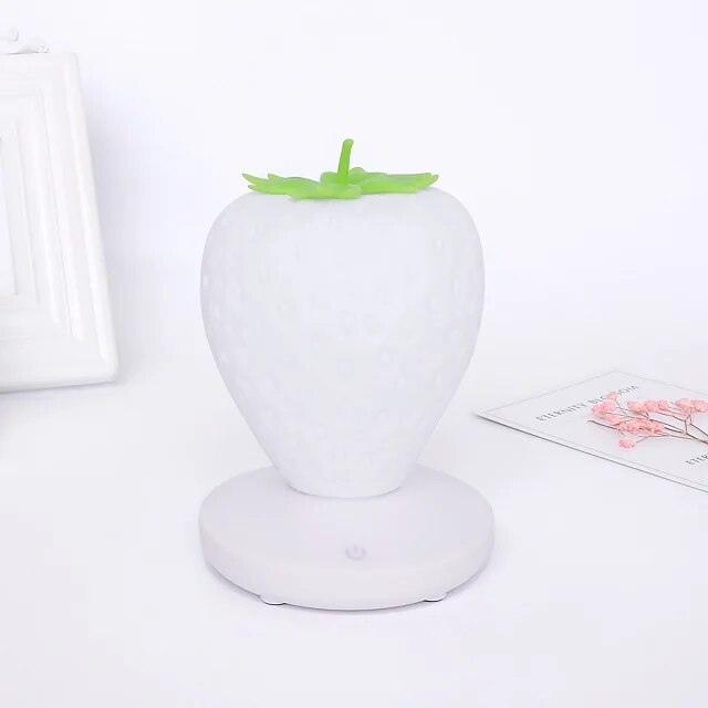Strawberry Night Light - Kawaii Stop - ambient glow, ambient lighting, battery-powered, bedroom decor, bedside lamp, cozy atmosphere, easy installation, enchanting decor, home accessories, LED night light, low consumption, modern lighting, portable lighting, romantic lighting, soft glow, strawberry night light, touch switch, USB powered, versatile light, warm white light, whimsical light