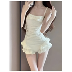 White ruffled romper.