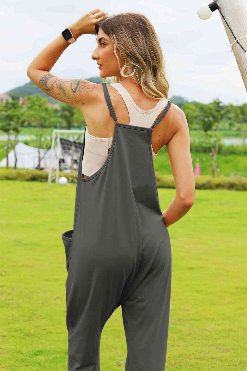 Sleeveless V-Neck Pocketed Jumpsuit - Kawaii Stop - Comfortable, Confidence Booster, Double Take, Effortless Elegance, Fashion, Must-Have Fashion, Opaque, Pocketed, Polyester Blend, Ship from USA, Sleeveless Jumpsuit, Slightly Stretchy, Statement Piece, Stylish, V-Neck, Versatile, Wardrobe Essential, Women's Clothing
