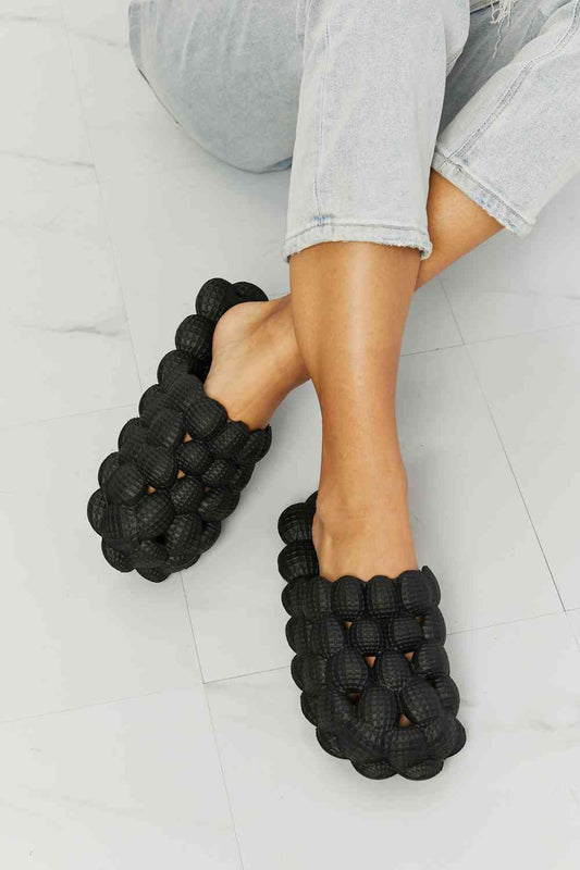 Laid Back Bubble Slides in Black - Kawaii Stop - Black Slides, Chic Slides, Comfortable Shoes, Cute Sandals, Elevate Your Style, EVA Material Slides, Fashion Accessories, Fashionable Slippers, Flats, NOOK JOI, Open Toe Slides, Platform Slides, Rubber Strap Slides, Ship from USA, Slippers, Stylish Slippers, Summer Style, Trendy Sandals, Women's Footwear