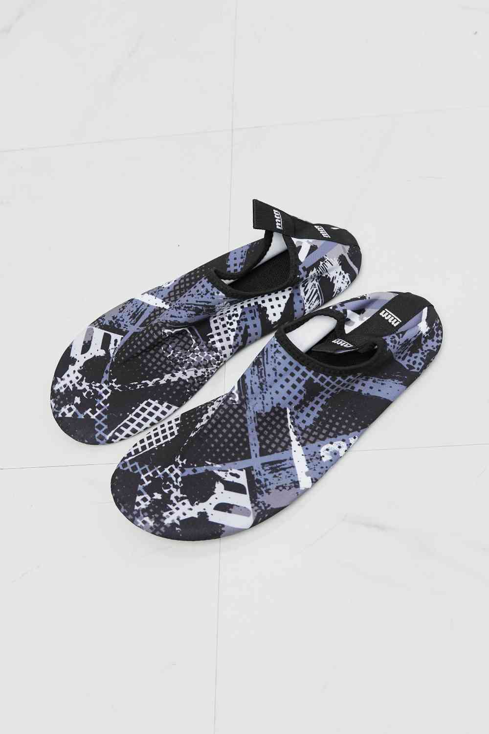 On The Shore Water Shoes in Black Pattern - Kawaii Stop - Aqua Footwear, Beach Adventures, Beach Days, Black Design, Comfortable Shoes, Durable Materials, Kayaking, Melody, Outdoor Activities, Printed Pattern, Rubber Sole, Safety First, Ship from USA, Slip-Resistant, Swimming, US Sizing, Water Protection, Water Shoes, Wet Surfaces
